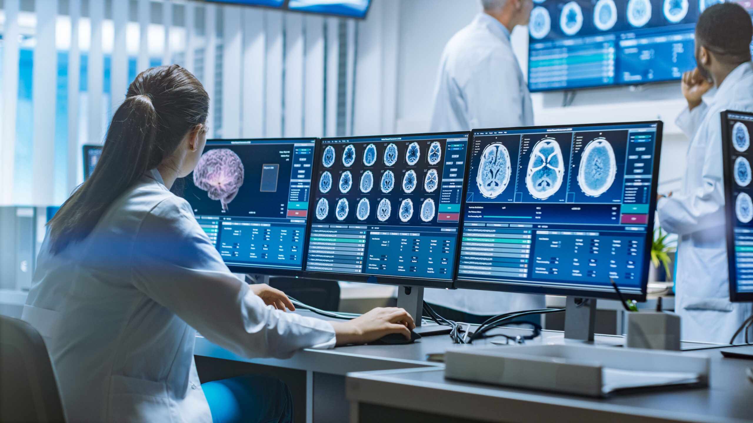 A medical professional analyzing brain scans